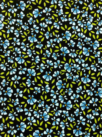 Blue flowers on black background (sold in 25cm units)