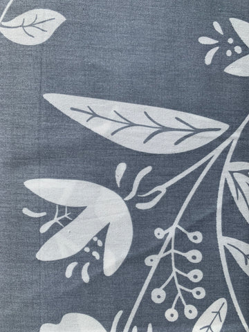 Backing:  Grey with large off-white designs- 2,7m wide 100% Cotton Sold in 25cm units