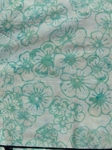 Aqua flowers on off white background -  Bali Collection (sold in 25cm units)