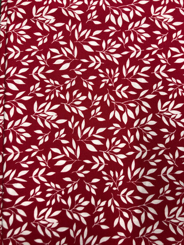 White leaves on red background (sold in 25cm units)