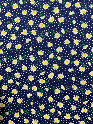 Small light yellow daisies on navy background