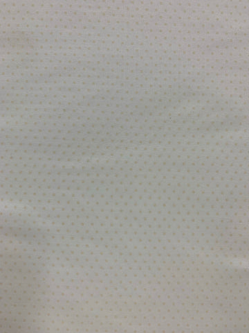 Soft cream dots on white background