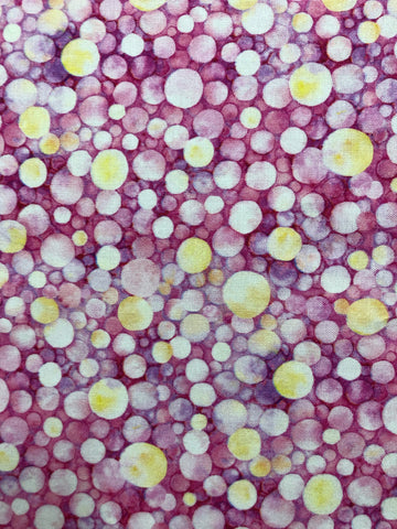 Yellow bubbles on pink